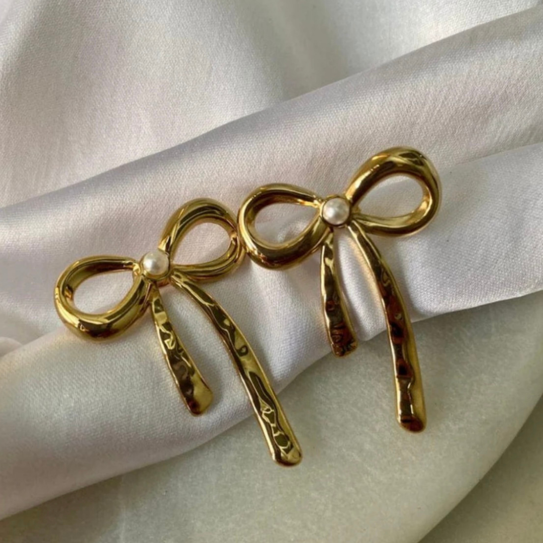 Golden Bow Antitarnish Earrings – Elegant Pearl-Detail Metallic Bow Studs